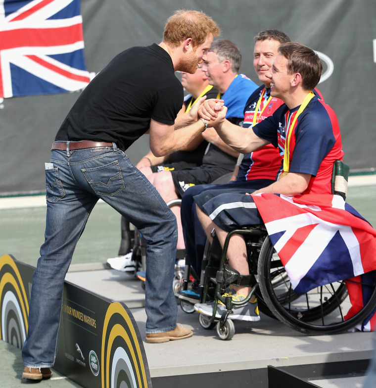 Prince Harry presents the Gold Medal to members of the United Kingdom