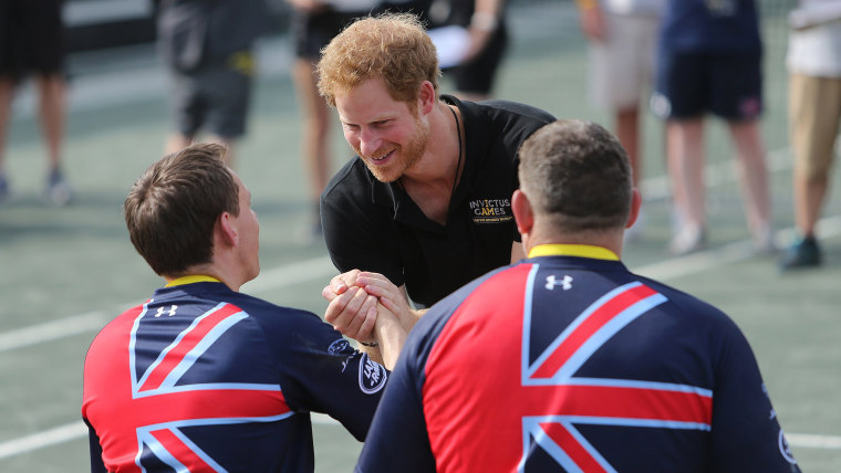 Prince Harry presents the Gold Medal to members of the United Kingdom