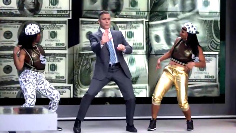 George Clooney in Money Master, dancing