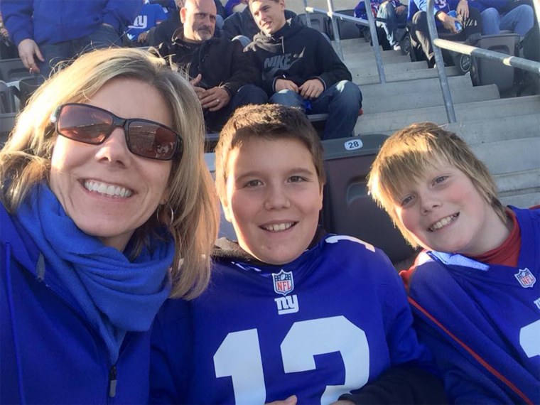 Julie Holcombe with her sons Ryan and Patrick, 12.