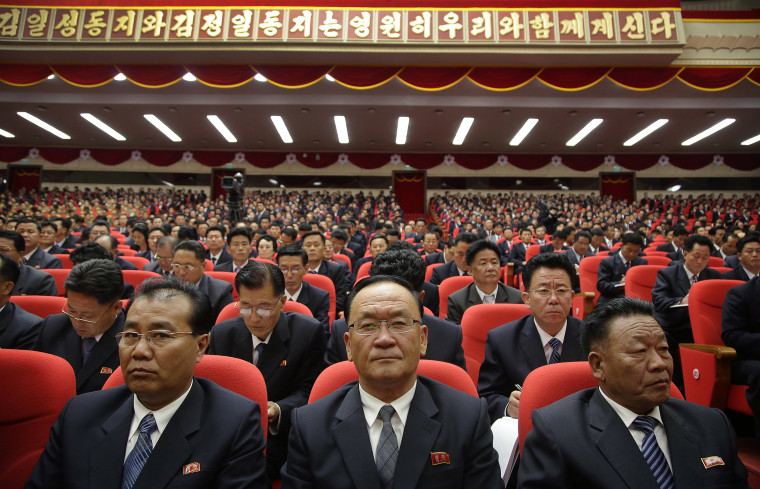 Image: Party representatives sit in the hall of the April 25 House of Culture