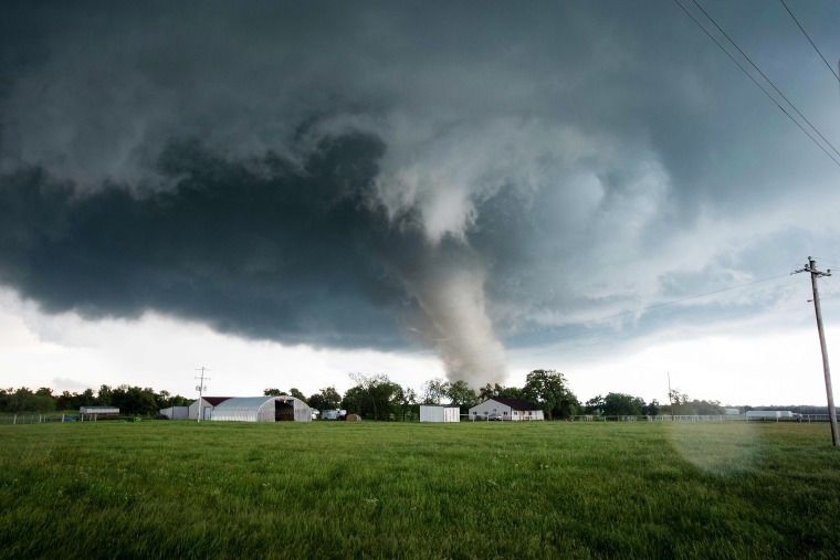 Image: A tornado rips through a residential area after touching down south of Wynnewood, Oklahoma