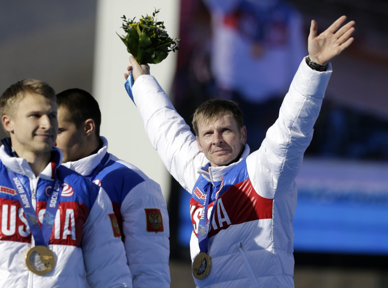 Image: The Russian team waves