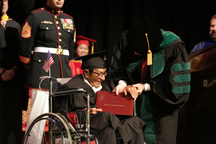 Alfonoso Gonzales, 96, receives his diploma from USC on May 13, 2016.
