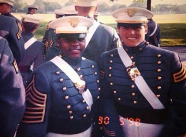 In this 1998 family photo provided by Sakima Brown, left, and her roommate Amy Thomas pose for a photo on their graduation day as cadets at West Point, in Hyde Park, N.Y. Self-expression is hardly a part of life for cadets at the United States Military Academy at West Point. There were just nine black women in her class, and she says that to make it at West Point meant to "shrink your blackness."
