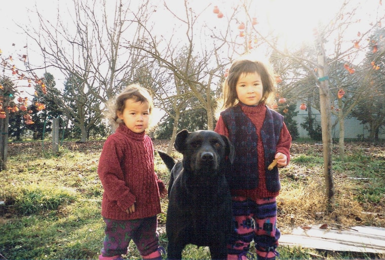 Frances Kai-Hwa Wang's daughters, Hao Hao and Mango, with their grandfather's dog, Terry