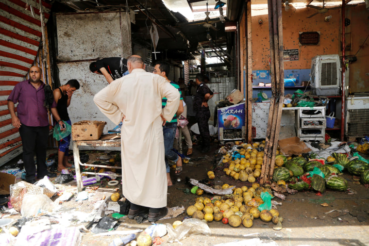 Image: The aftermath of a bombing in a marketplace in Baghdad