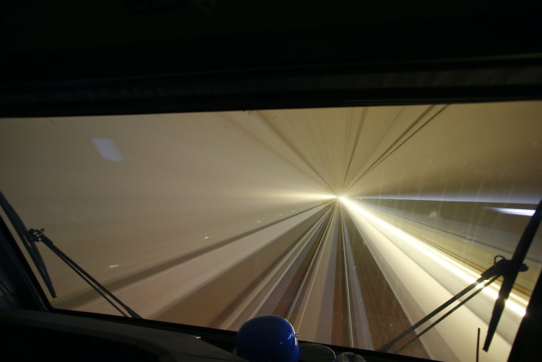Image: The view from a train driver's cabin of the high-speed Gotthard Base Tunnel.