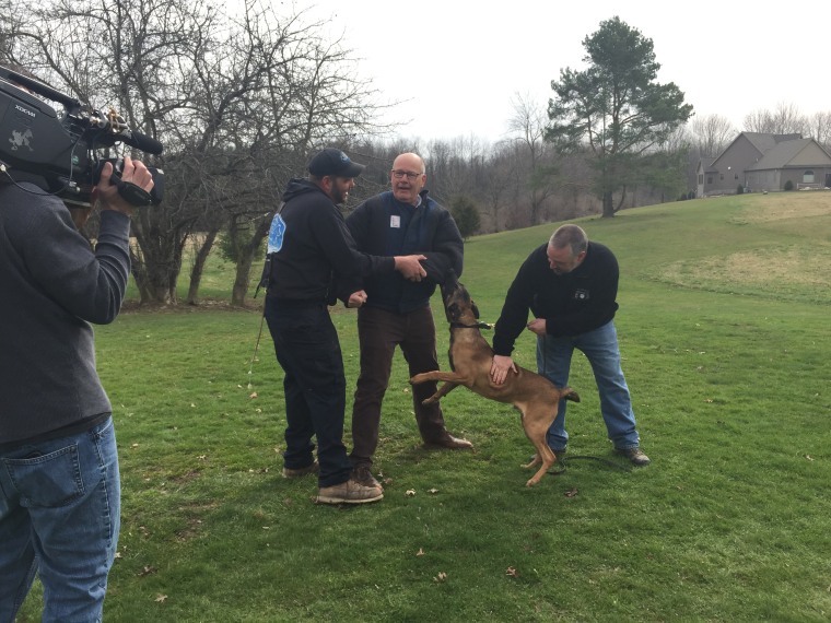 Harry Smith with Specter, the third clone of an exceptional U.S. Special Forces dog.