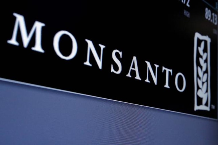 Monsanto is displayed on a screen where the stock is traded on the floor of the NYSE