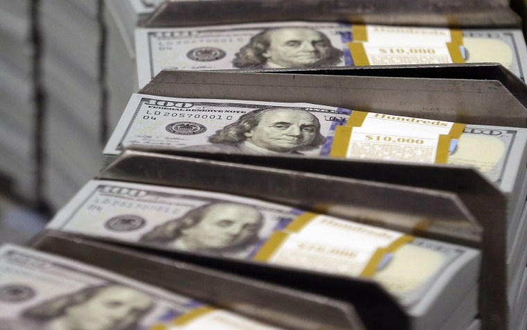 Image: Freshly cut stacks of $100 bills