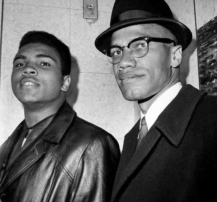 UNITED STATES - MARCH 02:  Cassius Marcellus Clay (Muhammad Ali) with Black Muslim leader Malcolm X at 125th St. and Seventh Ave.