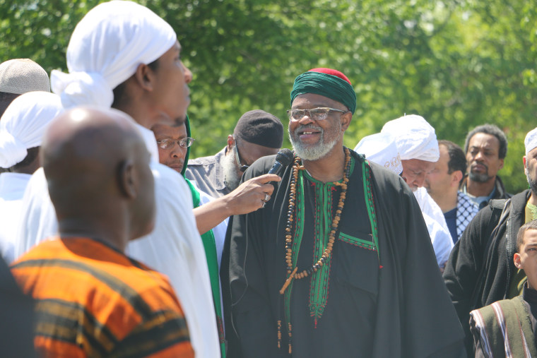 Imam Al-Hajj Talib 'Abdur-Rashid delivers a prayer and reflections to several hundreds of people who came to Ferncliff Cemetery in Hartsdale, New York, to honor Malcolm X on his birthday.