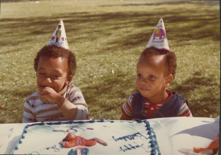3-year-old Lecrae eating birthday cake with his cousin.
