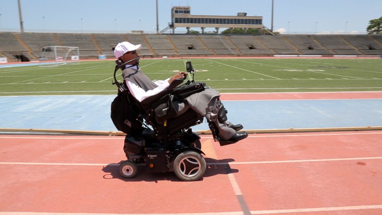 Edwards, visiting the football field where his paralyzing accident occurred when he was 17.