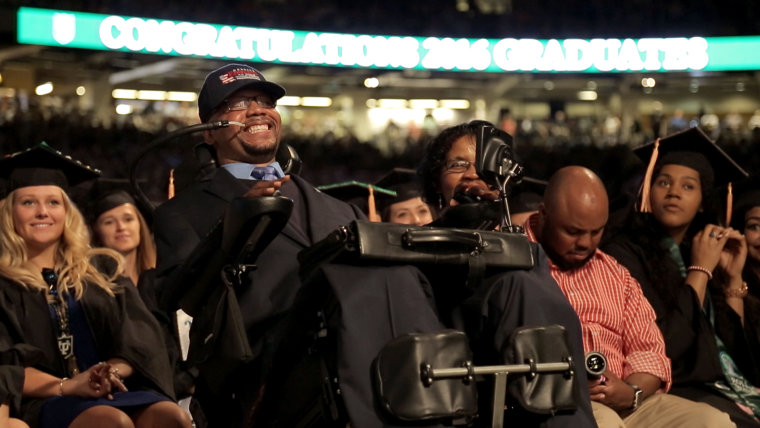 Derrick Edwards cheering during Hoda Kotb's commencement speech at Tulane University earlier this month.