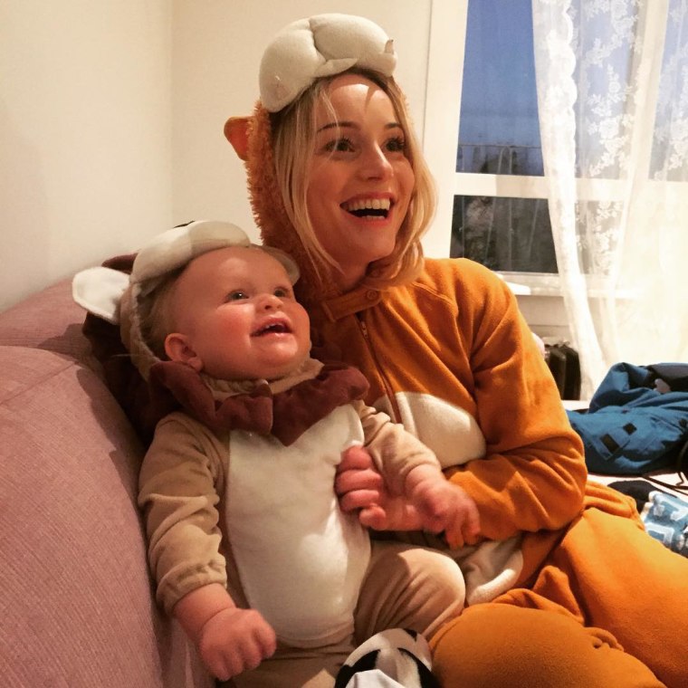 Thorunn Antonia Magnusdottir and her daughter, Freyja, share a laugh together.