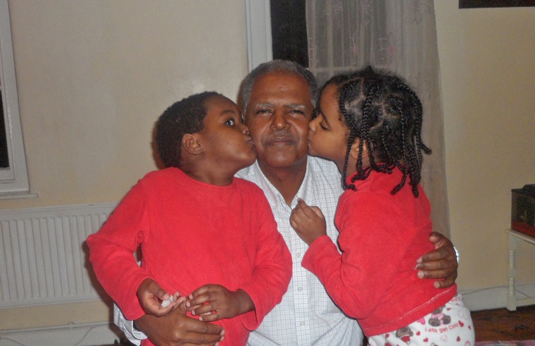 Image: Andy Tsege with twins Menabe and Yilak
