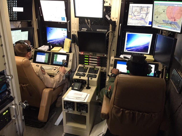 Inside a ground control station, where two drone operators train.