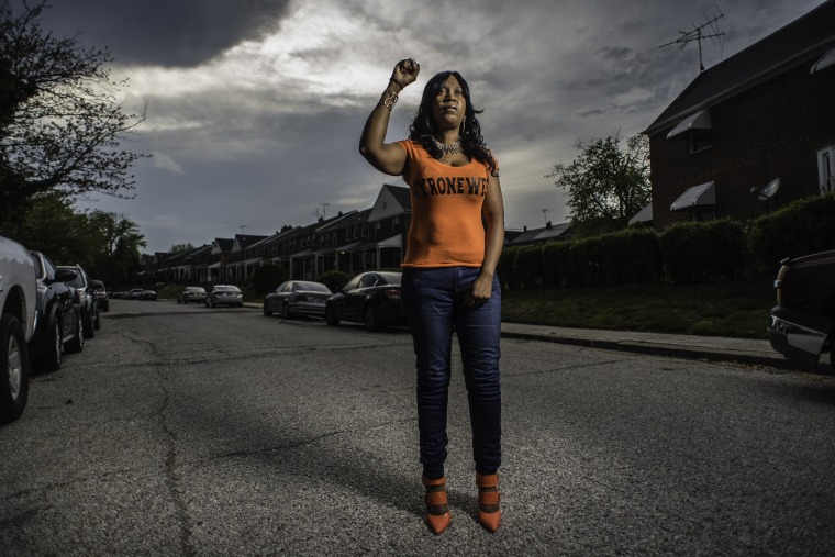 Tawanda Jones, is an activist who has been seeking justice for her brother, Tyrone West, who was allegedly beaten to death during a traffic stop with Baltimore City Police in 2013. She's pictured at the site where her brother was killed.