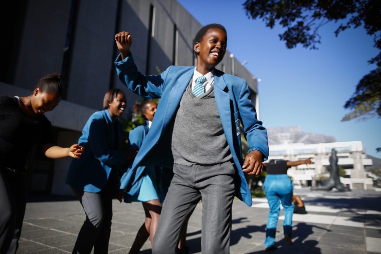 Image: South African school children from Chris Hani High dance during Africa Day celebrations
