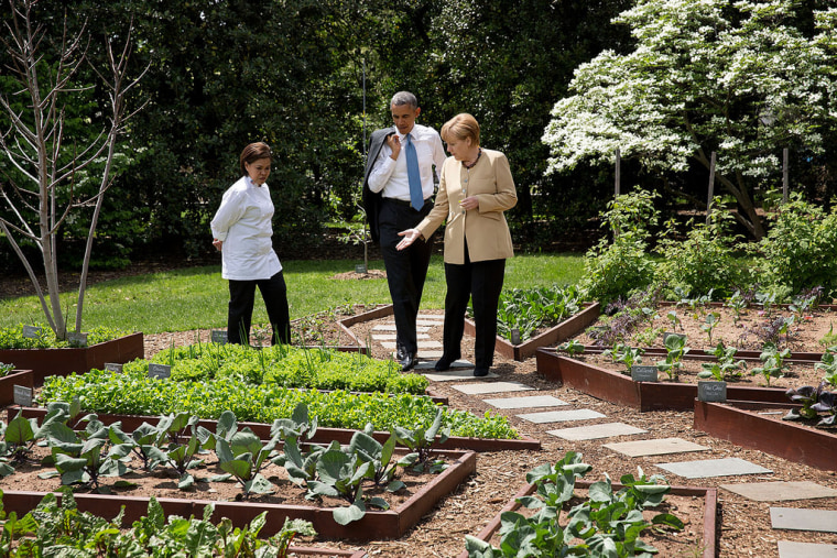 White House executive chef Cris Comerford, left, with President Barack Obama and former Chancellor of Germany Angela Merkel