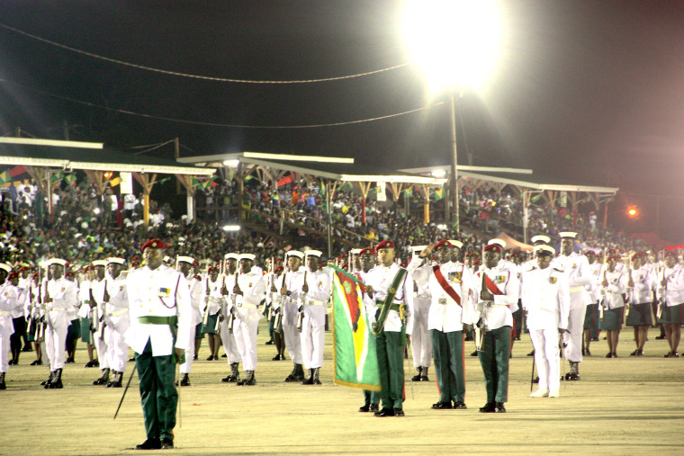 Members of Guyana’s Defence Force take center stage at D’Urban Park in Georgetown during Guyana’s 50th Anniversary of Independence Flag Raising Ceremony on May 25, 2016.