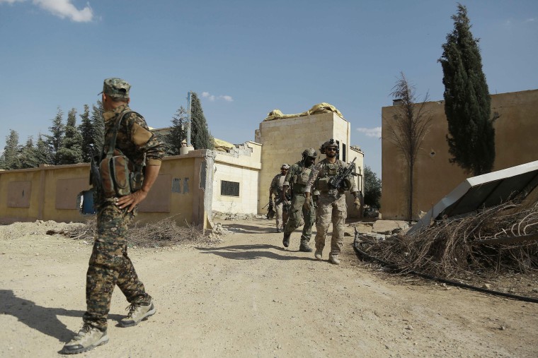 Image: US special forces walk through Fatisah