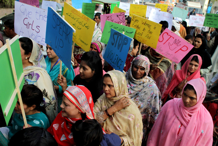 Pakistani women observe the International Day for the Elimination of Violence against Women, in Lahore, Pakistan, on Nov. 25, 2015.