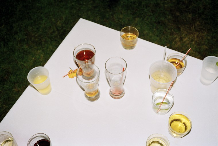 Beer and cocktail glasses on a white table