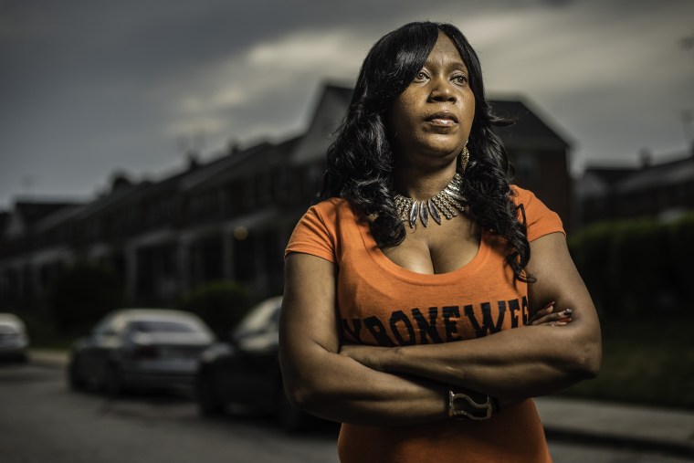 Tawanda Jones, is an activist who has been seeking justice for her brother, Tyrone West, who was allegedly beaten to death during a traffic stop with Baltimore City Police in 2013. She's pictured at the site where her brother was killed.