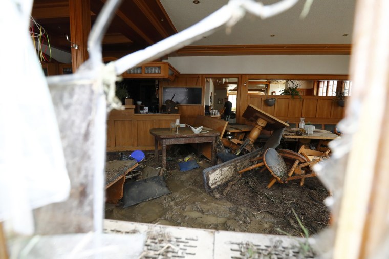 Image: A ruined restaurant is pictured through a broken window following floods in the town of Braunsbach in Baden-Wuerttemberg