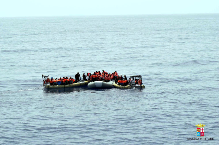 Image: Migrants being rescued at sea