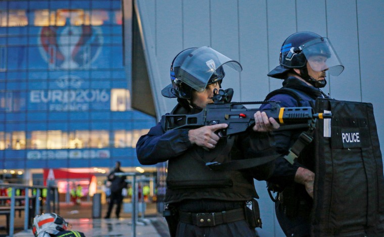 Image: French Police forces take part in a mock attack drill outside the Grand Stade stadium in Decines