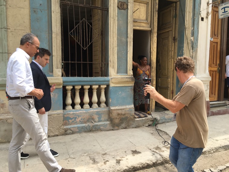 The 'On Assignment' crew films a "walk and talk" interview on the streets of Havana, Cuba with Airbnb co-founder Brian Chesky.