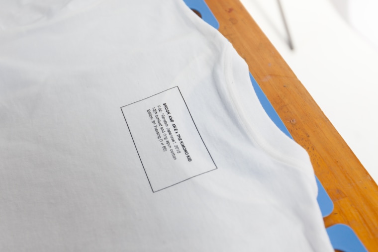 The back of the shirts describe the title of the project and the print batch.