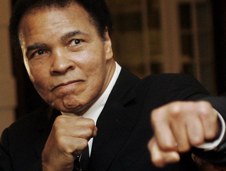 Image: U.S. boxing great Muhammad Ali poses at the World Economic Forum in Davos