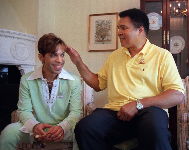 Image: Muhammad Ali embraces Prince during a meeting in 1997