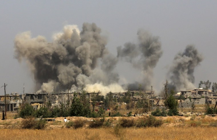 Image: Smoke rises after an airstrike by U.S.-led coalition warplanes