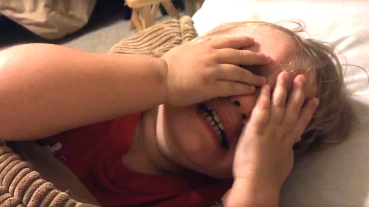 a boy having a meltdown after his dad shaved his beard