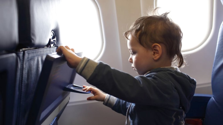 toddler in airplane