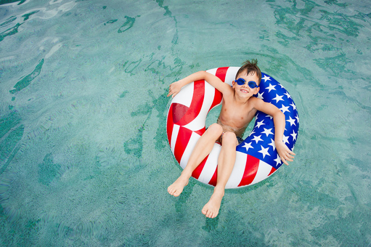 Capturing kids while floating on brightly colored pool toys can make for an interesting summertime image.