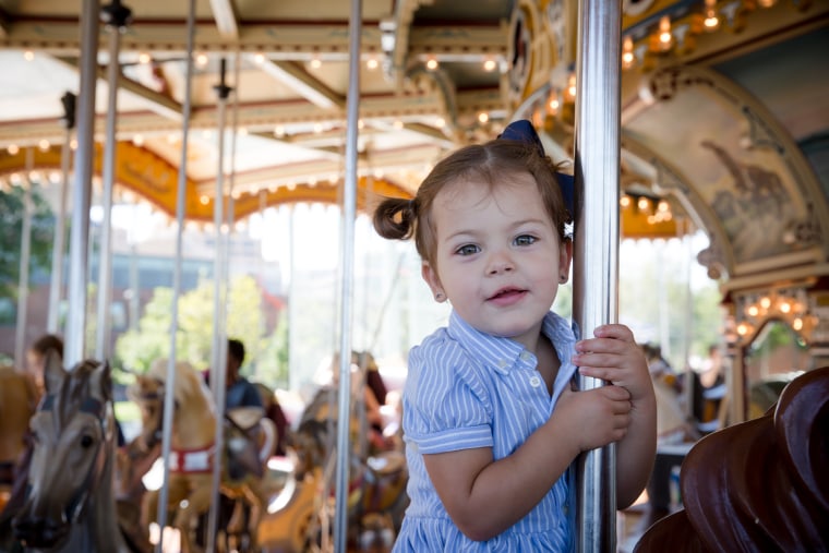 Gunther recommends wearing a camera strap around your neck to steady your lens on moving rides.