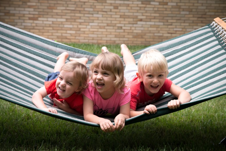 When it comes to cute hammock photos, Guenther says playing a game of "tickle bug" is a great way to get kids laughing and smiling for the camera.