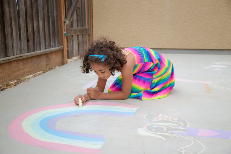 Hicks says a great way to document your child's summer creativity is to stage a sidewalk chalk photo session.