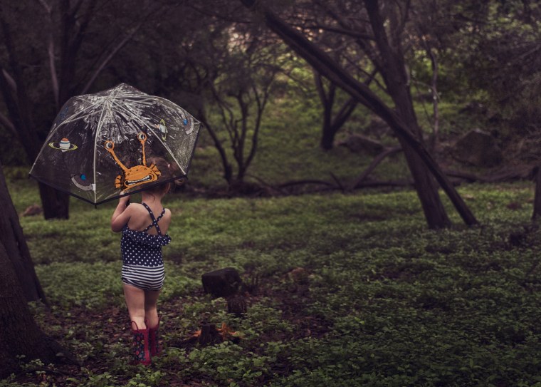 Summer rain storms can be a time to snap some adorable shots of warm-weather attire mixed with rubber boots and umbrellas.