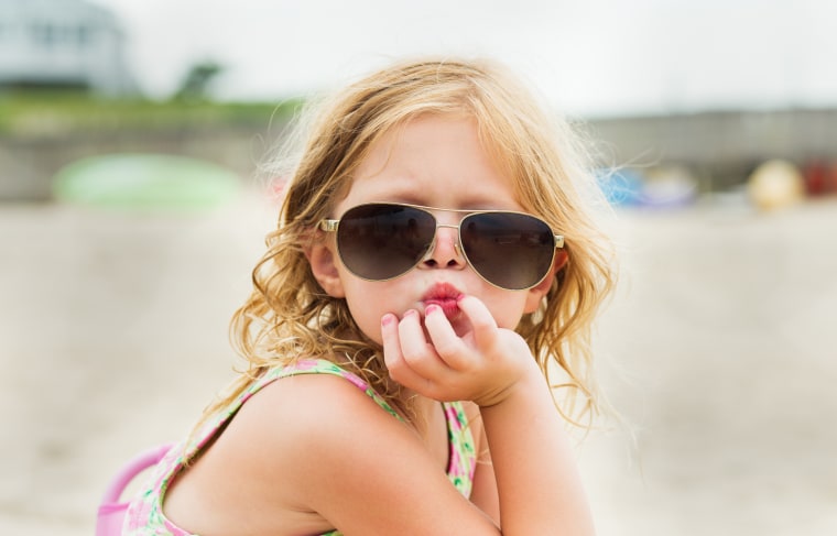 The only thing cuter than kids wearing sunglasses, may just be kids wearing grown-up sunglasses.