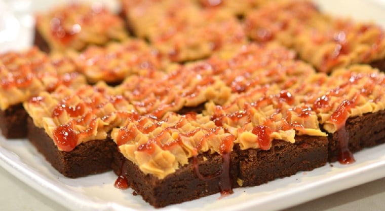 Chocolate brownies with peanut butter and jelly frosting