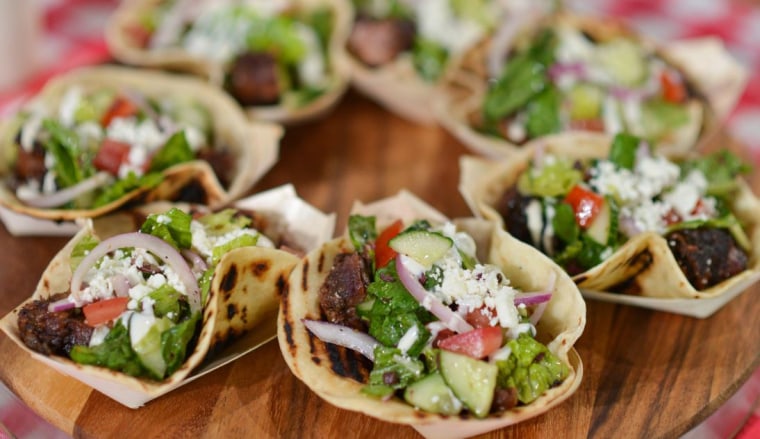 Chris Lilly makes brisket tacos with Greek salad