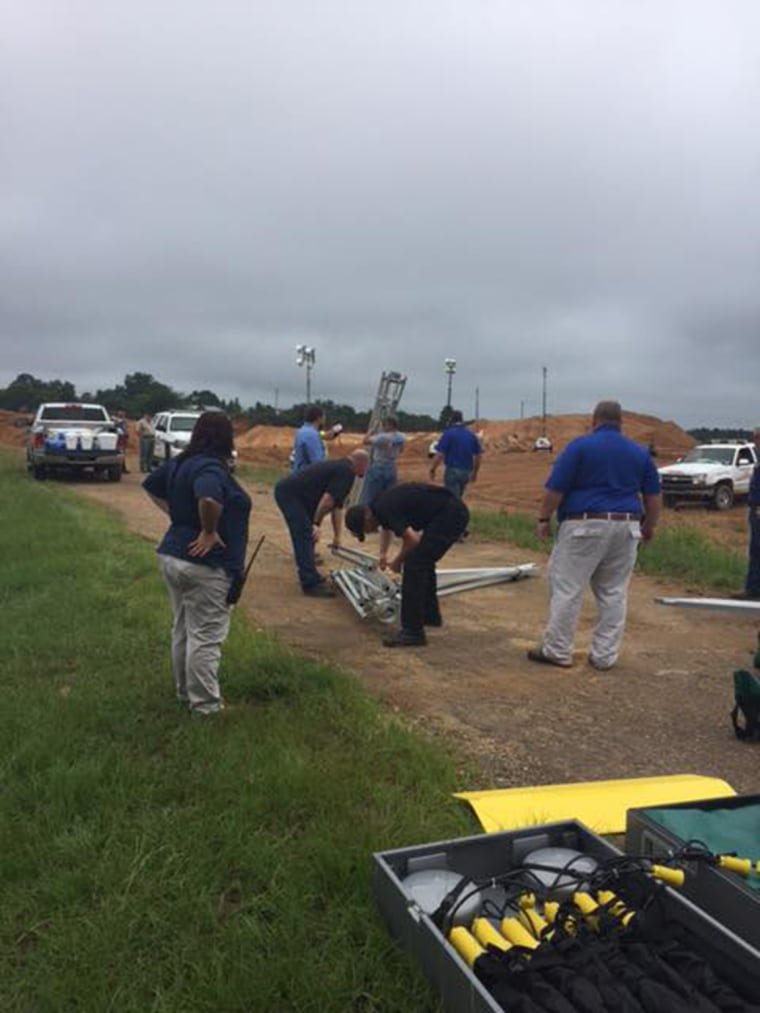 Image: Mississippi Emergency Management Agency team at the site of the landslide